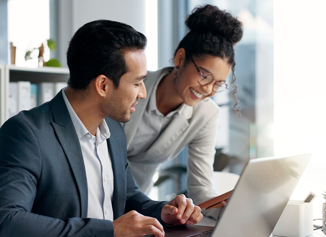 Business Insurance - Business People in the Office Doing Research for Collaboration Project