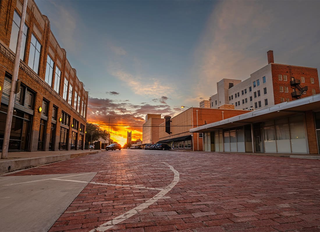 Lubbock, TX - Sun Setting on a Old Brick Street in Downtown Lubbock, Texas